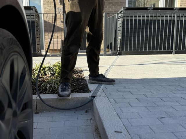 EV charging channel installed across a pavement