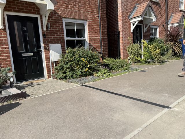 EV charging channel installed across a pavement