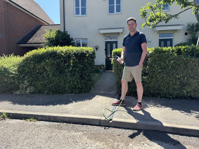 EV charging channel installed across a pavement