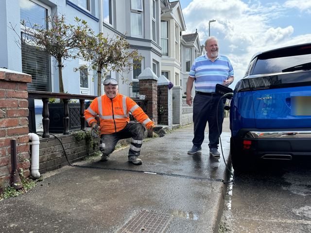 EV charging channel installed across a pavement