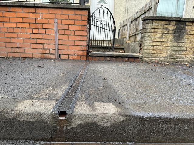 EV charging channel installed across a pavement