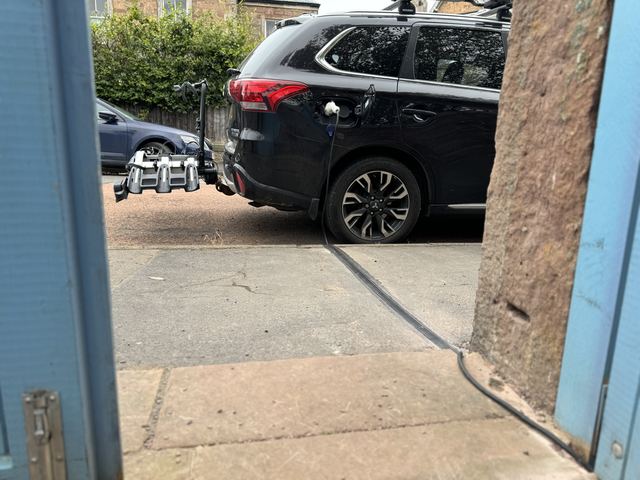 EV charging channel installed across a pavement
