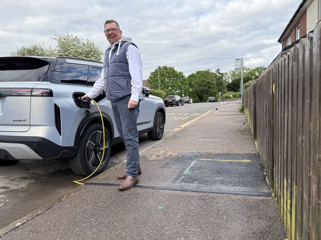EV charging channel installed across a pavement