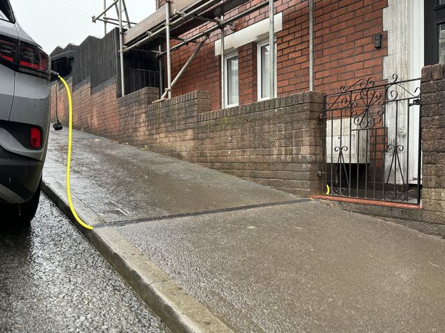 EV charging channel installed across a pavement