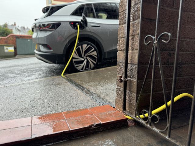 EV charging channel installed across a pavement