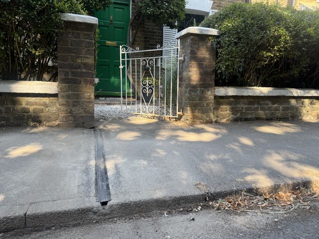 EV charging channel installed across a pavement