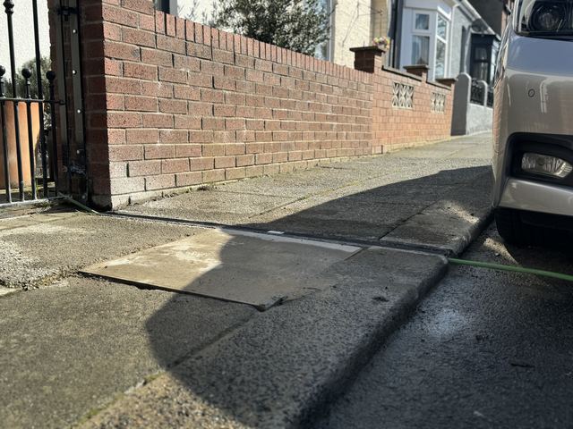 EV charging channel installed across a pavement